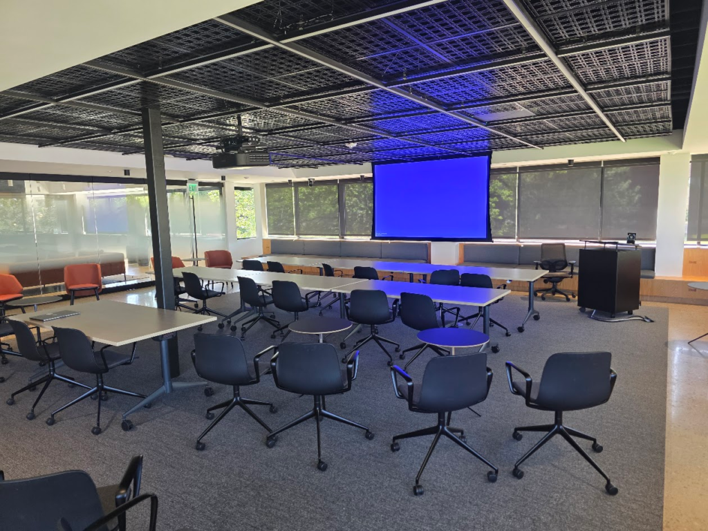 Modern office training room with projection screen